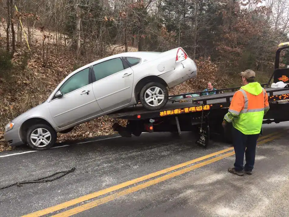 Truck winching a car